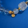 Rock Crystal/Lion-Head Charm