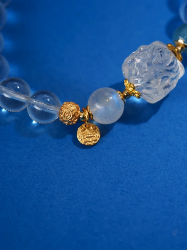 Rock Crystal/Lion-Head Charm